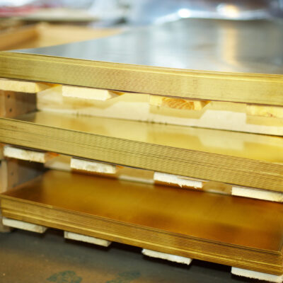 Many brass sheets, warehouse brass plates. close up