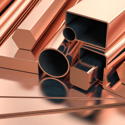 Copper tubes and different profiles in warehouse background. Different copper metal rolled products. 3d illustration